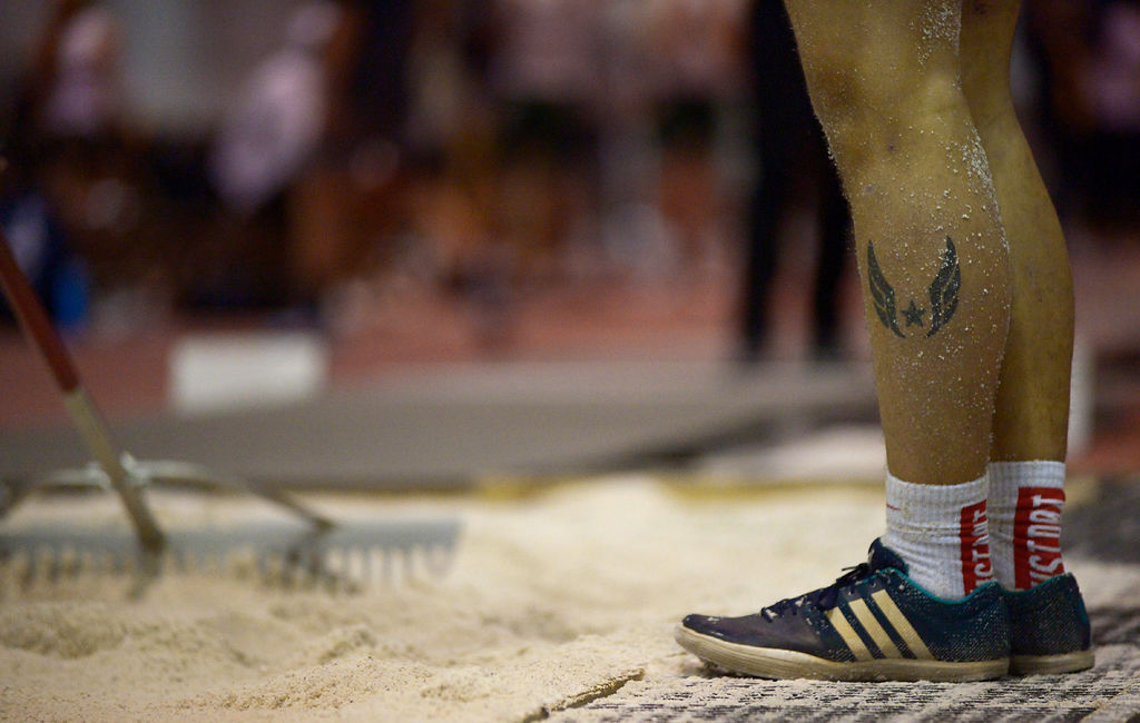 A long jumper stands after his jump Friday, Dec. 6, 2019 at Hearnes Field-house in Columbia.